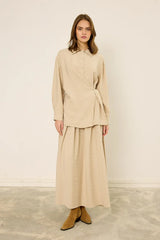 Wickelbluse mit seitlichem Knopf
